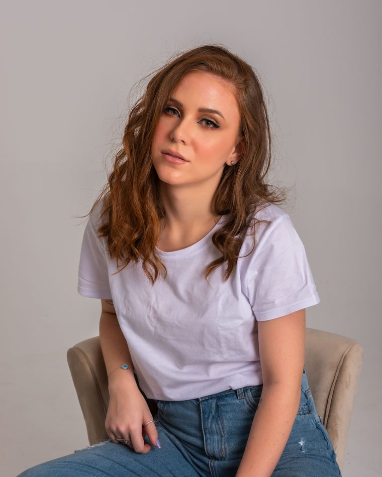Model wearing a clean white everyday t-shirt